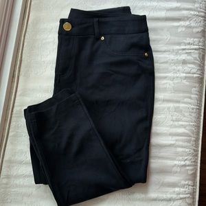 Black skinny leg Jeggins with faux front pockets and back pockets.